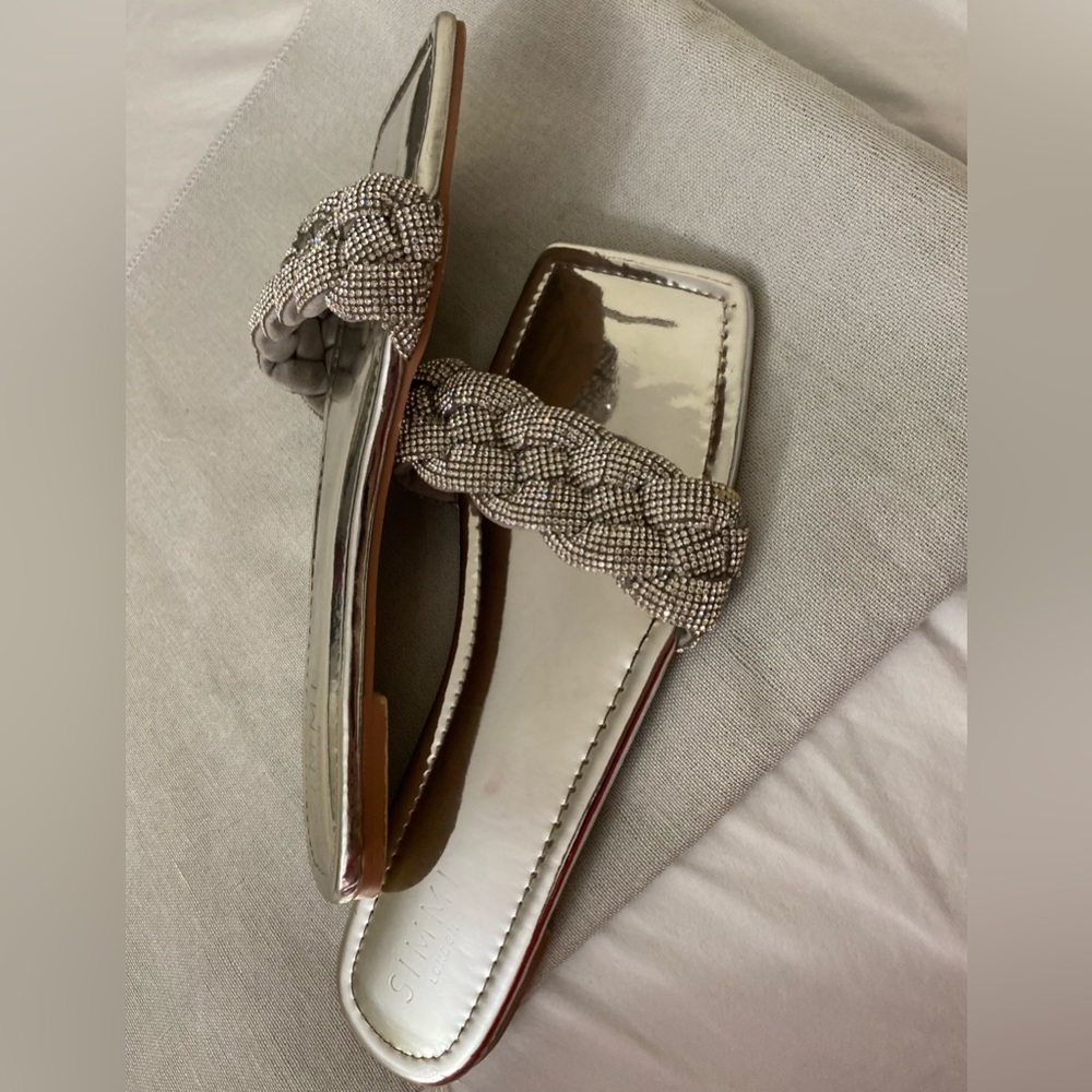 Shiny silver flat sandals from Simmi London. Size US 41, EU 8.